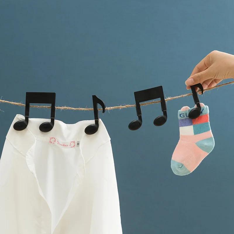 Baby Clothing Drying Rack - 2er-Set Musiknoten-Wäscheklammern, schwarze Federklammern, kreativer Kleiderständer